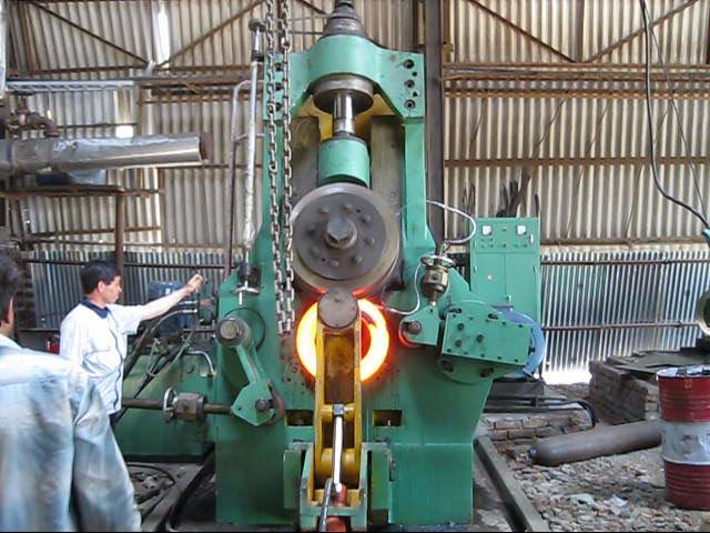 Workers are using rolling ring machine (D51-vertical) forging